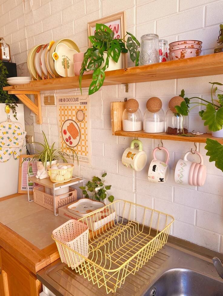Neat shelves, cheerful details, and fresh greenery