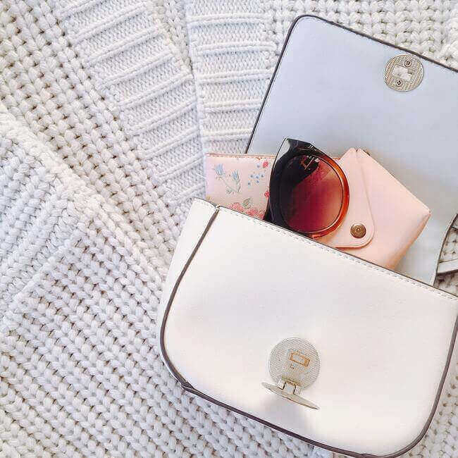 Extra Handbags and purses. decluttering tips for minimalism - Everything Abode