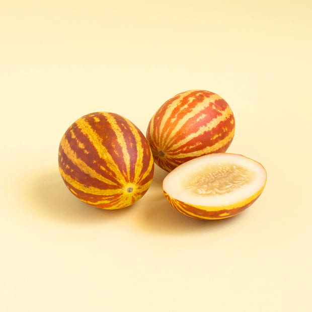 mini melons with striped skin like watermelon