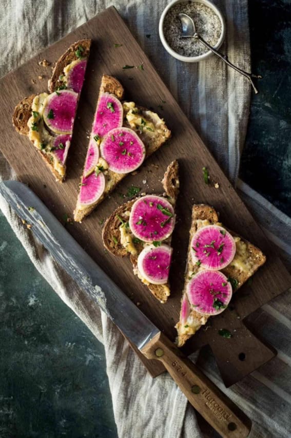 radishes on pizza to show its a easy to grow and eat veggie