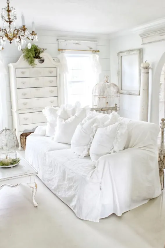 Start by Rearranging your furniture. A white living room.