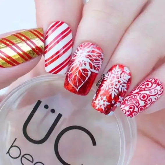 Short nails with red and gold holiday patterns