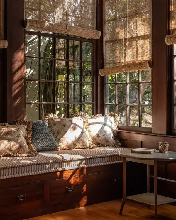 Cozy sunroom with built-in bench and floral cushions