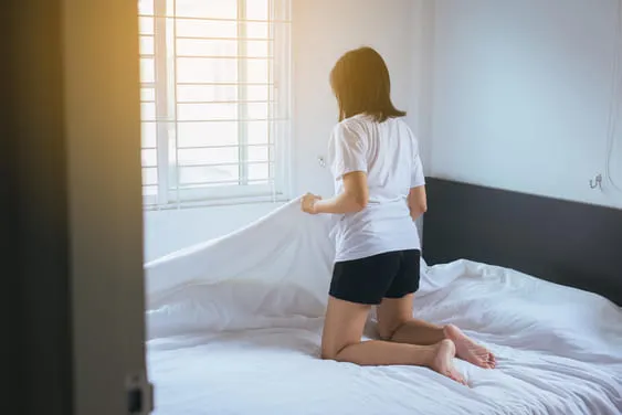 make the bed to stay organized before noon