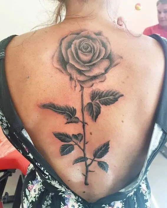 tattoos with roses on the back